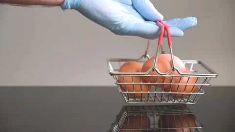 Shopping basket of eggs on the table Stock Footage 153420527