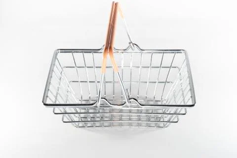 Shopping baskets on a white background. Macro shot Stock-Fotos