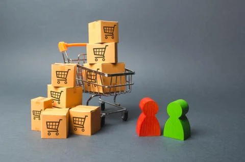 Shopping cart with cardboard boxes with a pattern of trading carts a buyer an Stock Photos