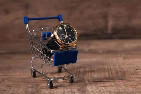 Shopping cart with clock , Stock Photos