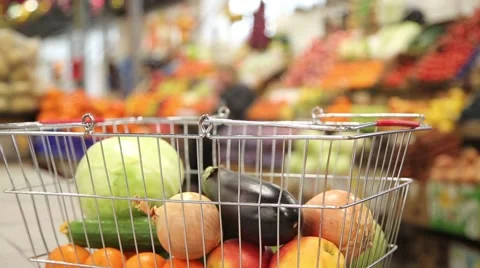 Shopping cart filled with vegetables and fruits Stock Footage 59336152