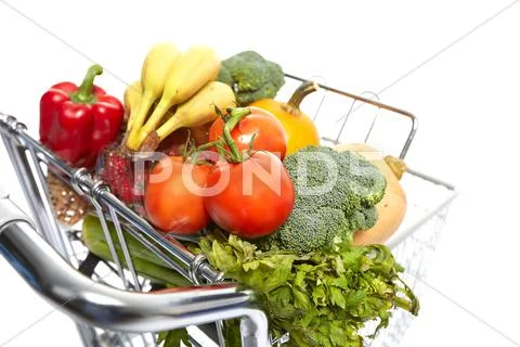 Shopping cart with food. Stock Photos