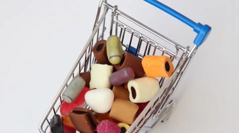 Shopping cart full of sweets Stock Footage 44339341