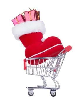 Shopping cart with a red christmas boot Stock Photos