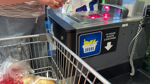 Shopping Cart in Store with Sharp Focus on Cart and Blurred Background Stock Footage 277105321