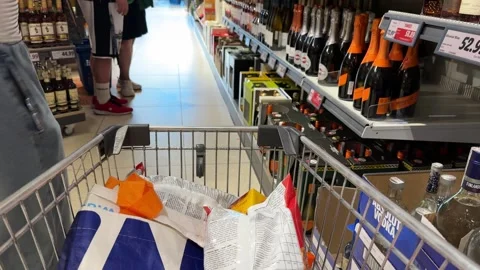 Shopping Cart in Store with Sharp Focus on Cart and Blurred Background Stock Footage 277136001