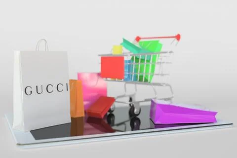 Shopping cart on a tablet computer and paper bag with Gucci logo. Editorial e Stock Illustration