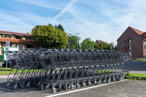 Shopping carts lined up in front of the store. Stock Photos