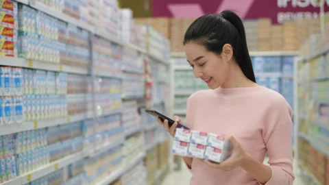 Shopping concepts of 4k Resolution. Young women use mobile phones to search.. Stock Footage 242202822