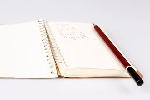 Shopping list in the diary Stock Photos