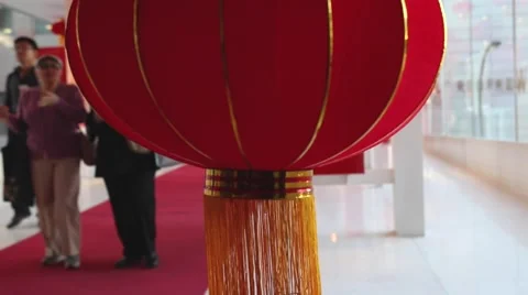 Shopping mall, customers walking on red carpet, red lantern Stock Footage 60054787