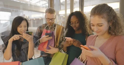 Shopping mall elevator with customers using phones Stock Footage 126580989