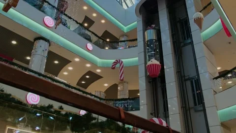 Shopping mall with moving elevator. Stock Footage 259634431