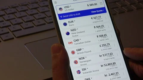 Shopping Online Comparing Prices Using Smartphone Currency Converter Stock Footage 143316176