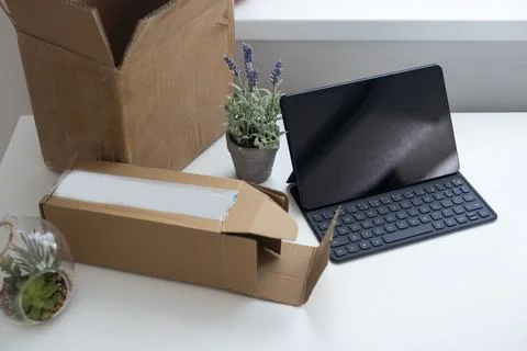 Shopping online e-comerce, Parcel boxes on a laptop. Stock Photos