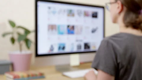 Shopping in an online store using a computer. Defocus Stock Footage 262481456
