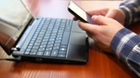 Shopping Online Using Cell Phone And Laptop Stock Footage 48440604