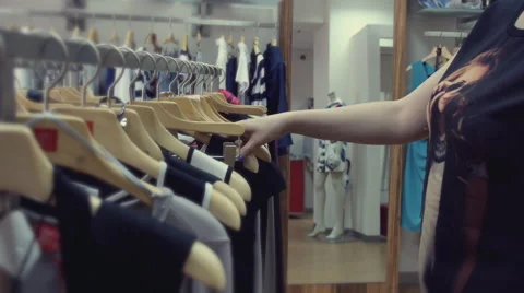 Shopping, selection of clothes in a boutique Stock-Footage 52359519