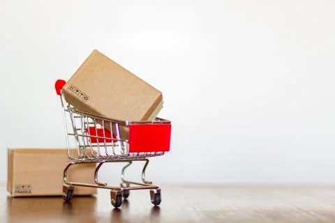 Shopping trolley with delivery boxes Stock Photos