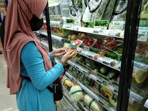 Shopping for vegetables Stock Photos