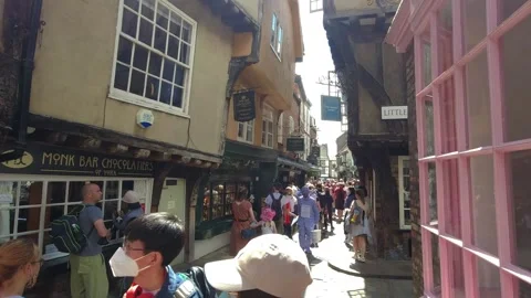 Shops and upper medieval buildings of the shambles street of york city, uk Stock Footage 248548286