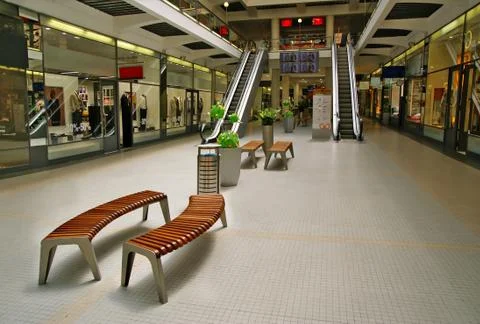 Shops, benches, escalators Stock Photos