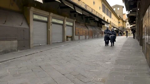 Shops closed, empty streets. Police guarding streets during Covid19 lockdown. Vídeo Stock 144436638