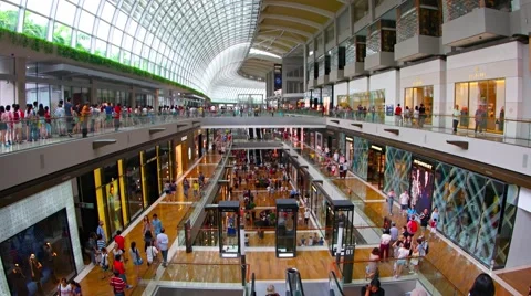 Shops promenade and customers inside of modern huge shopping mall Vidéo 60141306