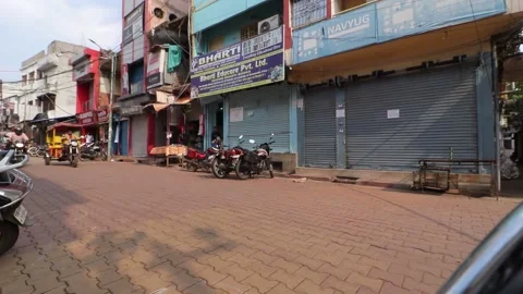Shops remain closed in the main market near Baidyanath Dham temple during Stock Footage 142640713