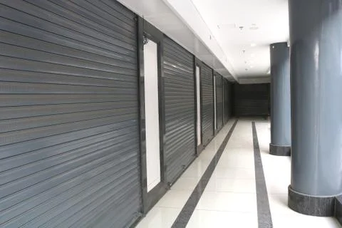 Shops, shutter, building low angle Stock Photos