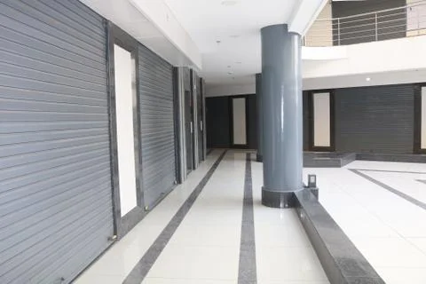 Shops, shutter, building low angle Stock Photos