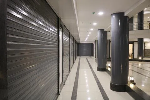 Shops, shutter, building low angle Stock Photos