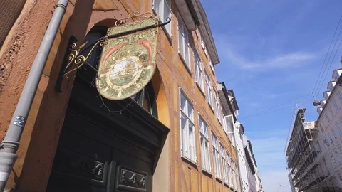 Shopsign in Copenhagens old city Stock Footage 99533860