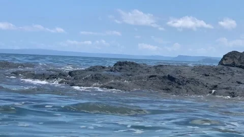 Shore 04 - wave hits rocks formation Stock Footage 282929246
