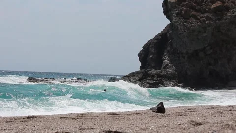 Shore of a beach with rocks Stock Footage 114238622