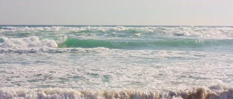 Shore of the beach waves with foam, steady shot Stock Footage 212467526
