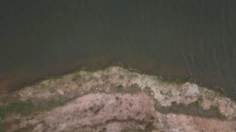 Shore with calm water loop Stock Footage 154917317