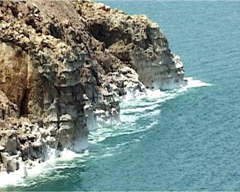 Shore of Dead Sea from Jordan side. Water level continues to fall. Stock Footage 120777227