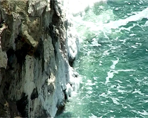 Shore of Dead Sea from Jordan side. Rocks are covered with white salt crystals Stock Footage 120777237