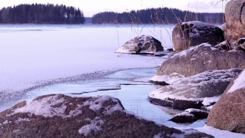 Shore of a freezing lake Stock Footage 70177567