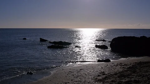 Shore line in to the sun Stock Footage 85561554