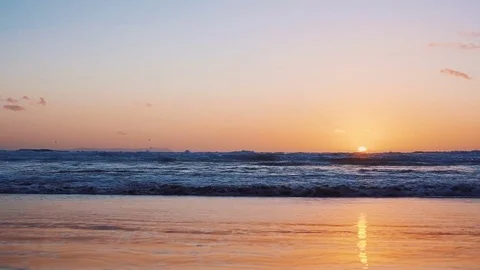 Shore of the ocean at sunset. slow motion Stock Footage 84764077