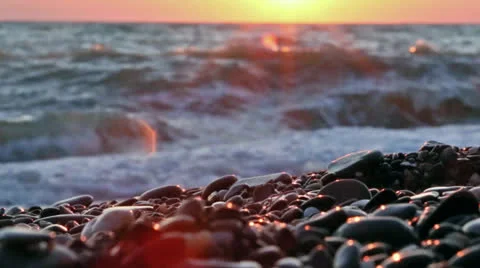 Shore tidal bore sunset 動画素材 26695312
