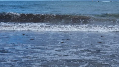 Shore waves exploding from rebounding swash. Slow mo copy space Stock Footage 111657823