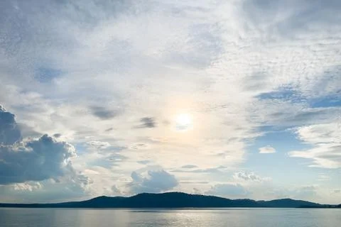 The shoreline of the river in the rays of the sun Stock Photos