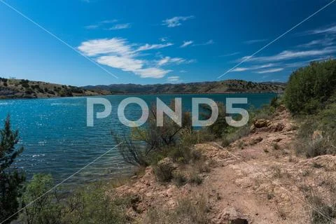 Shoreline vista of Bill Evans Lake in New Mexico. Stock Photos