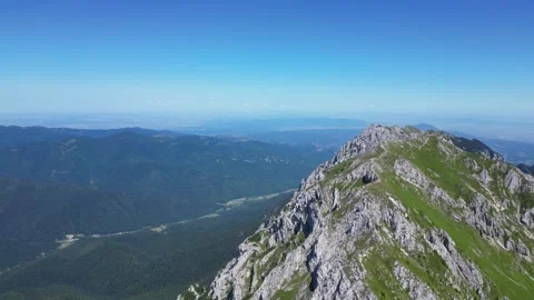 Short 4K drone shot over mountain peak – cinematic aerial view Stock Footage 343818418