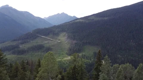 Short Aerial Reverse Drone Shot of Mountain Valley Landscape Stock Footage 248905887