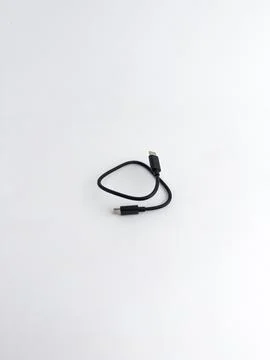 Short black USB type C data and charging cable isolated on white background Stock Photos