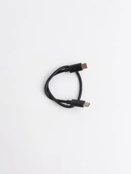 Short black USB type C data and charging cable isolated on white background Stock Photos